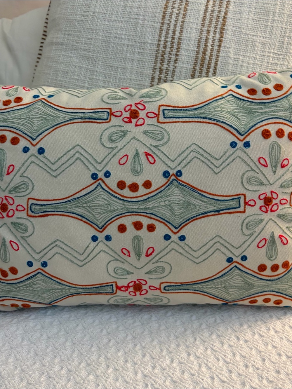 Crate & Barrel Joon Down Accent Pillow with geometric pattern blue red teal